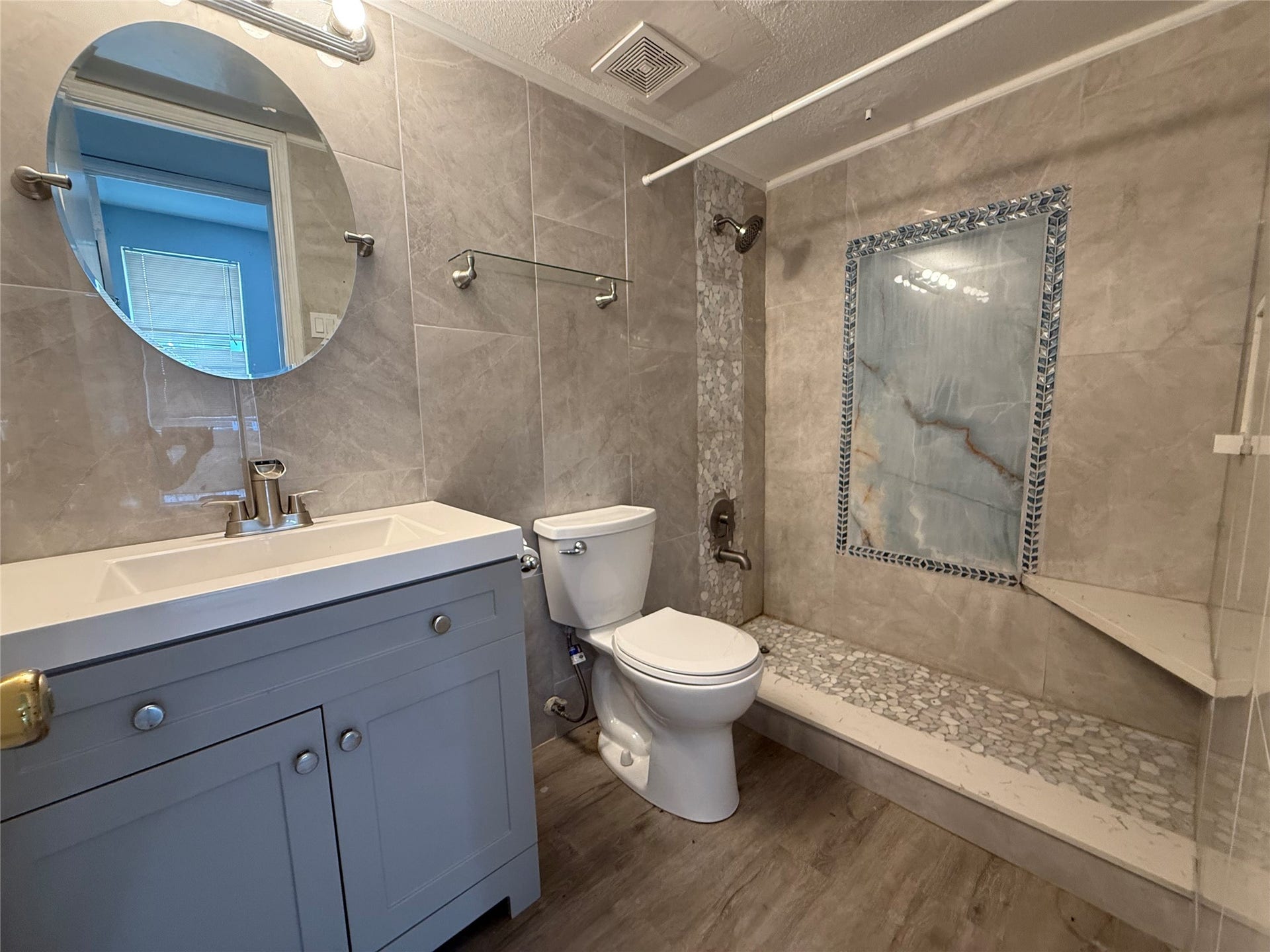 9550 Deering Drive, #210, Houston, TX 77036 Full bathroom has been updated and features an oversized shower.