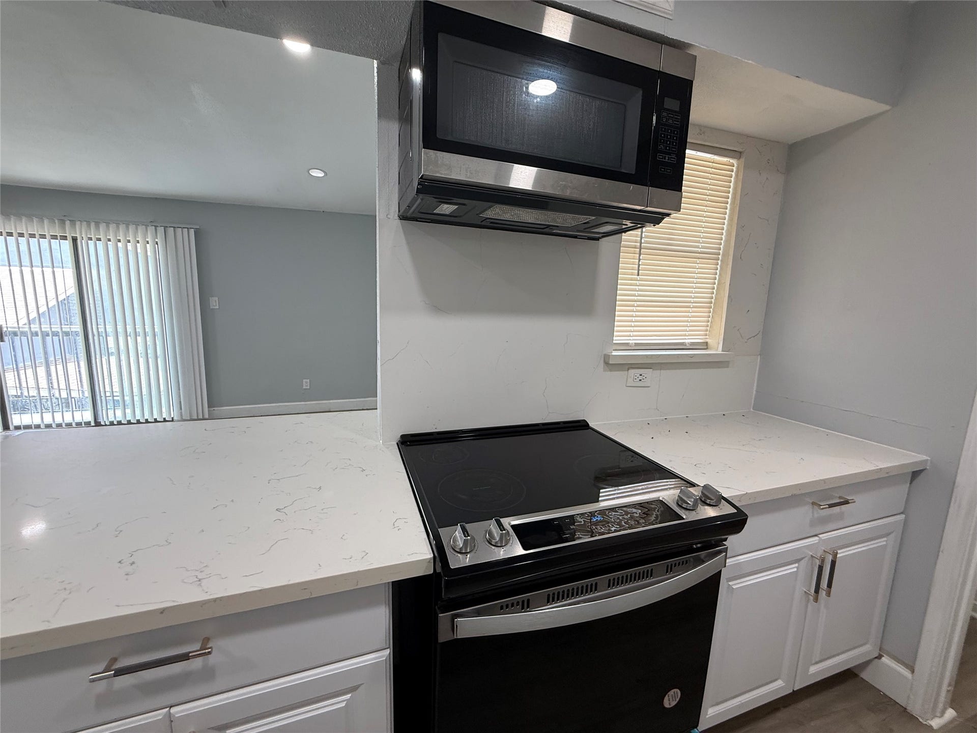 9550 Deering Drive, #210, Houston, TX 77036 Kitchen is open to the living area and offers so much counter and cabinet space.