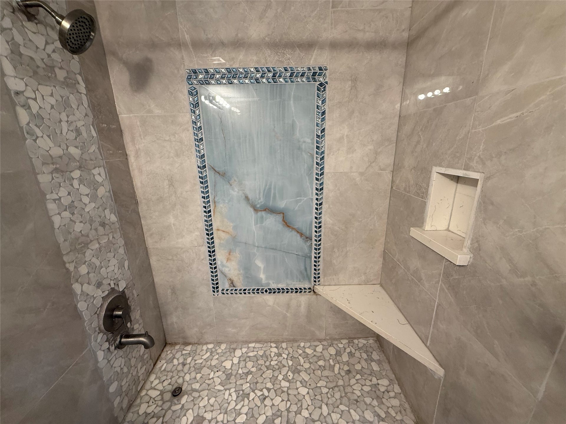 9550 Deering Drive, #210, Houston, TX 77036 Beautiful tilework in the shower.