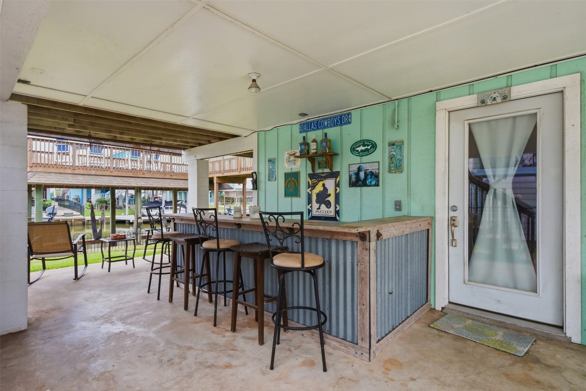 2 S Sandpiper Street, La Marque, TX 77568 Entertain guests with your personal bar overlooking the canal!