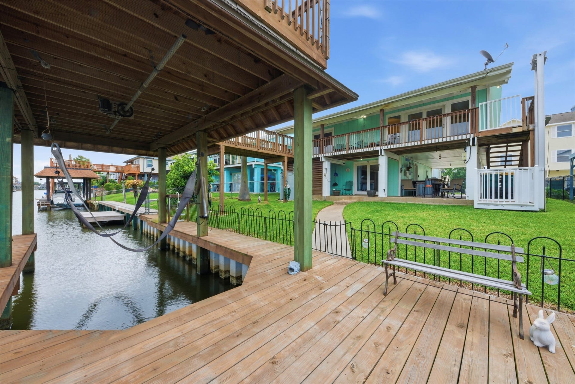 2 S Sandpiper Street, La Marque, TX 77568 Store your boat with your personal lift and dock.