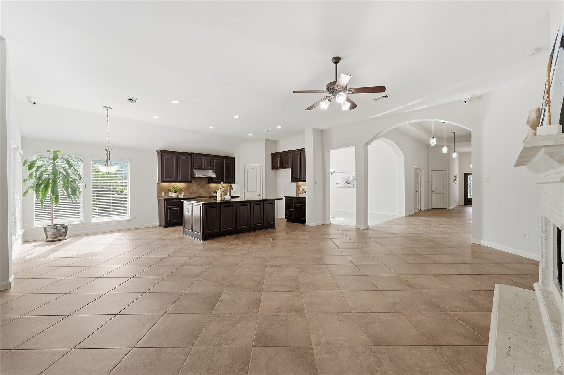 13812 Lakewater Drive, Pearland, TX 77584 Open-concept design seamlessly connects living, dining, and kitchen for everyday living and entertaining