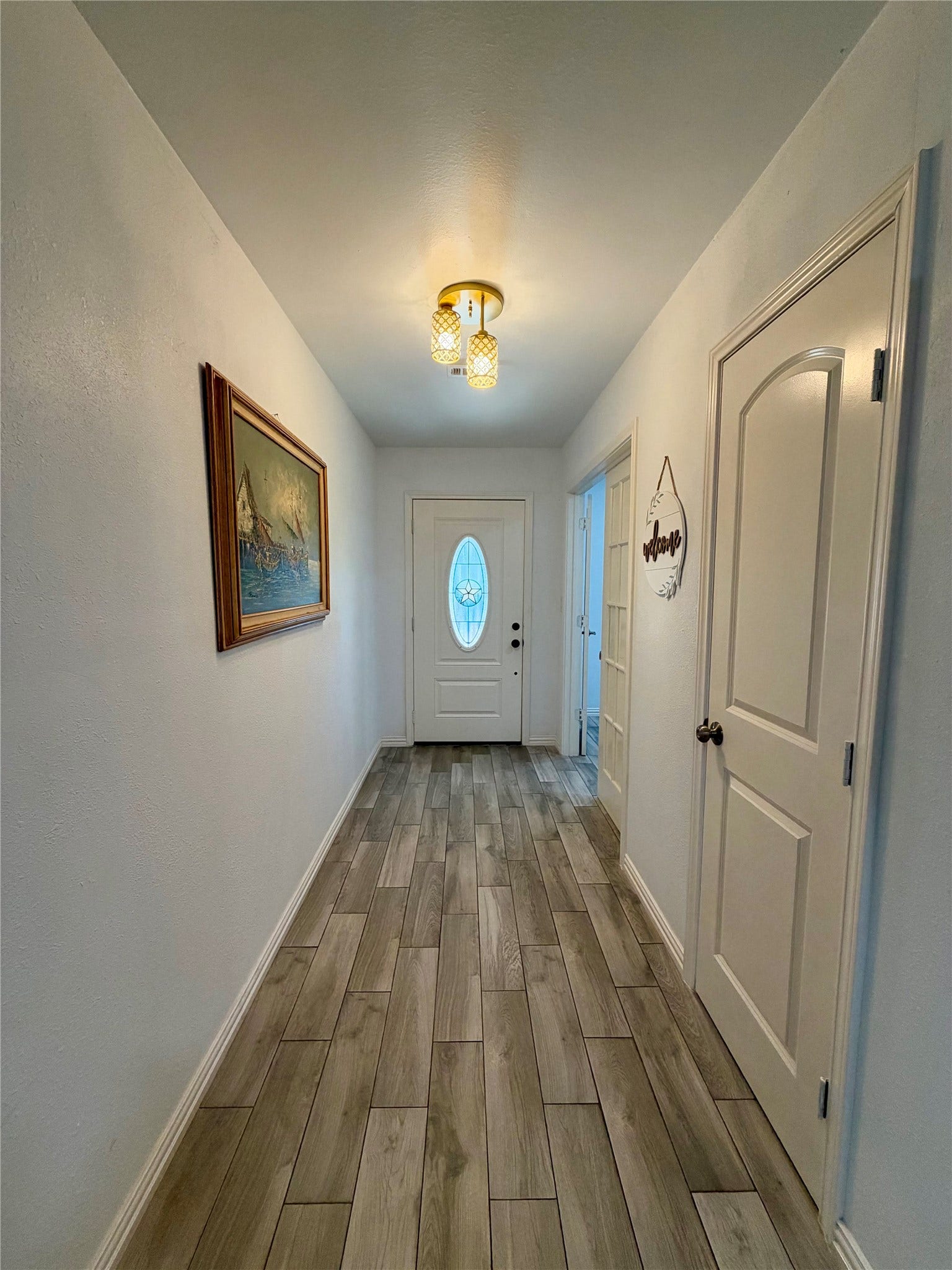 5420 Avenue O, Galveston, TX 77551 Looking back towards the front door. Roomy coat closet on the right.