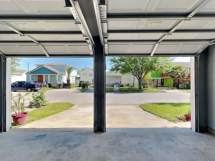5420 Avenue O, Galveston, TX 77551 Garage opens to the double-wide driveway