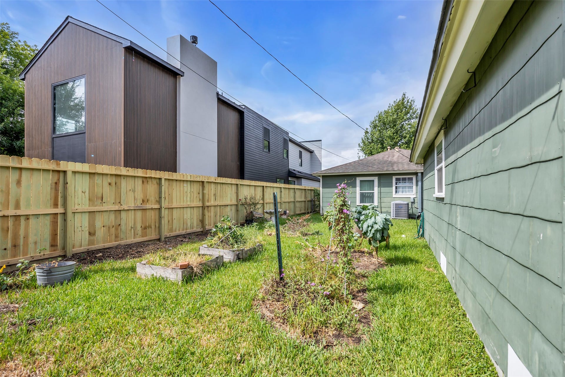 1518 Afton Street, Houston, TX 77055 There is a new house being built next door, but the backyard still maintains a "private feel" as there are no windows that overlook the yard