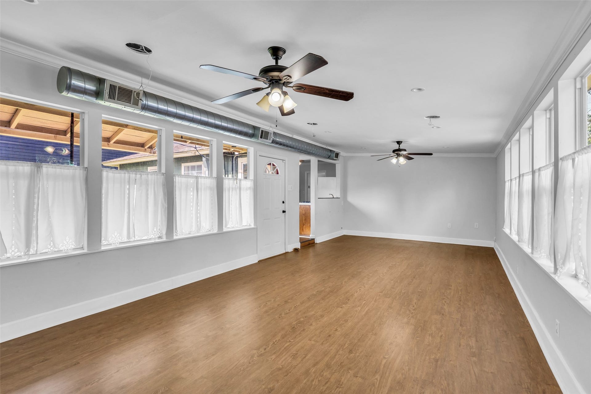 1518 Afton Street, Houston, TX 77055 To the left you will notice a covered patio outside the wall of windows