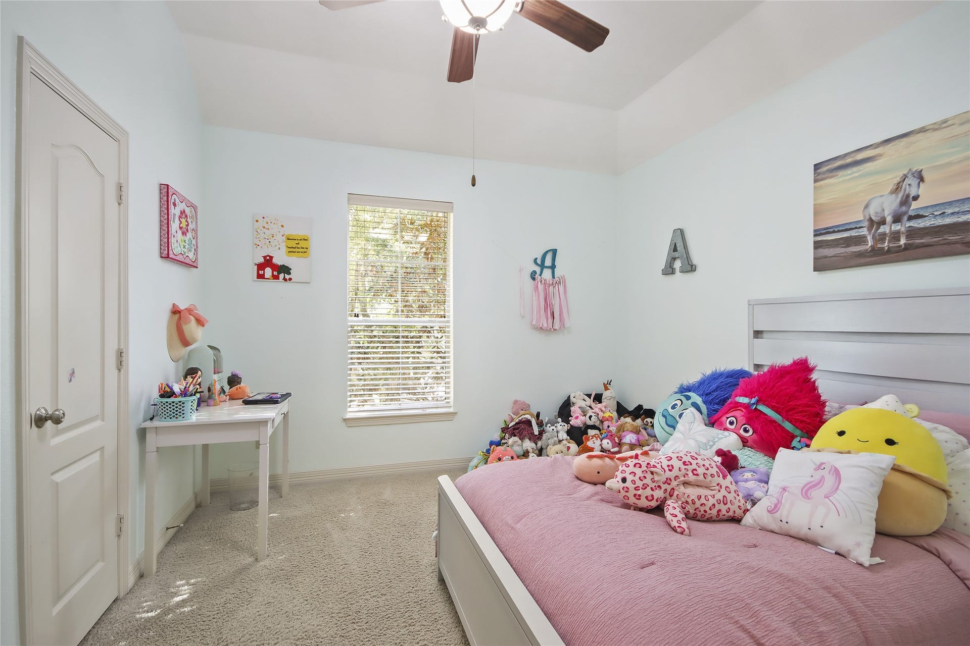 27906 Iberville Glen Dr, Katy, TX 77494 The third bedroom located upstairs offers natural lighting and views of the front yard.