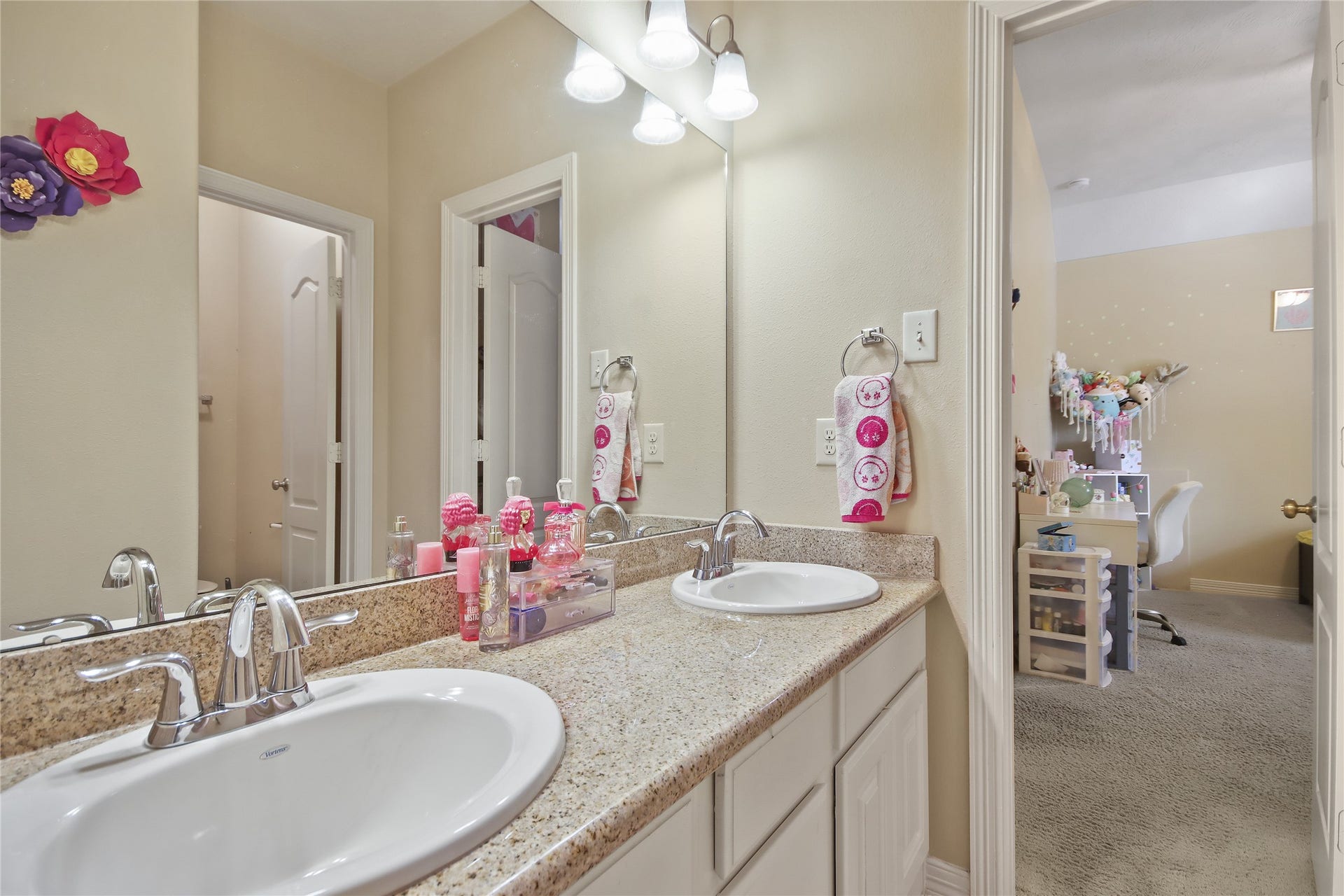 27906 Iberville Glen Dr, Katy, TX 77494 Jack and Jill bathroom with double sinks is located between the second and third bedroom.