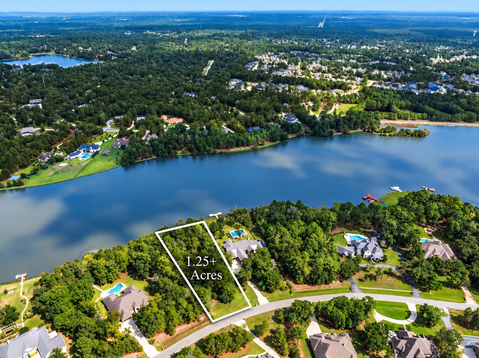 236 Lakeside Hills Drive, Montgomery, TX 77316 1.25+ Waterfront Acres in the premier gated section of Ridge Lake Shores!