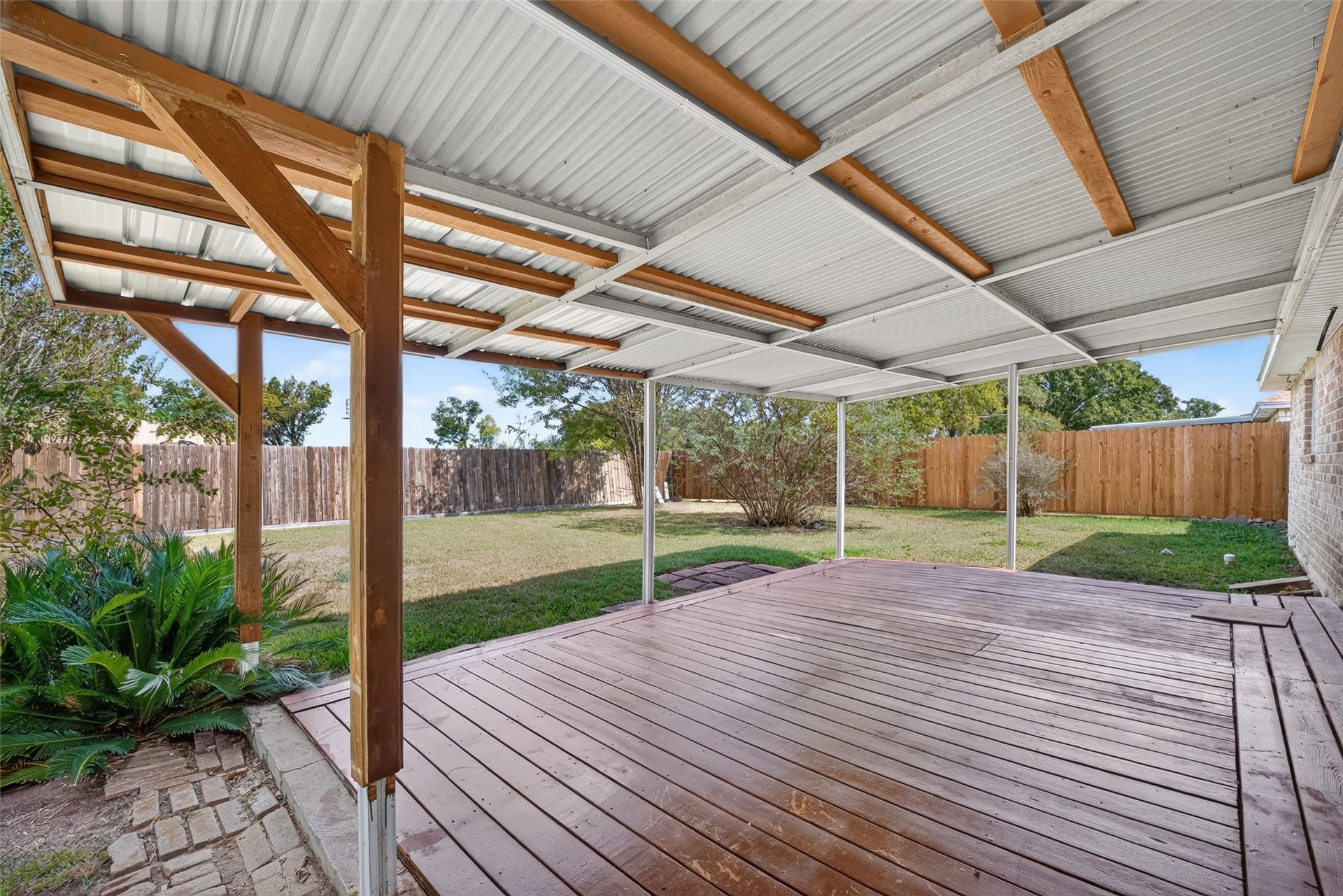 12207 Flushing Meadows Drive, Houston, TX 77089 Huge covered back patio with a spacious backyard space too!