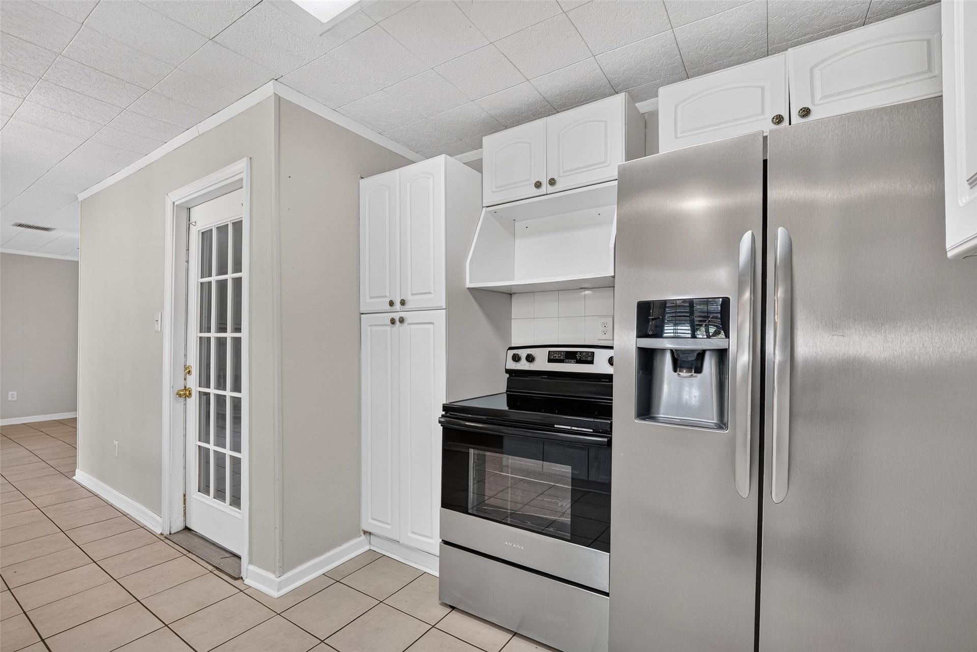 12207 Flushing Meadows Drive, Houston, TX 77089 Door leads to garage. Utility room located right inside the garage