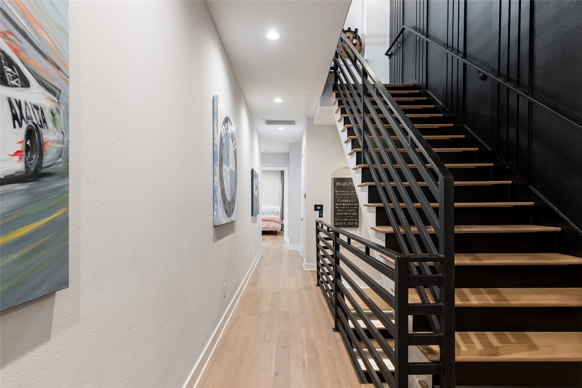 906 Knox Street, Houston, TX 77007 Rather than treating the staircase as purely functional, the renovation turns it into a defining architectural element that visually connects each level of the home.