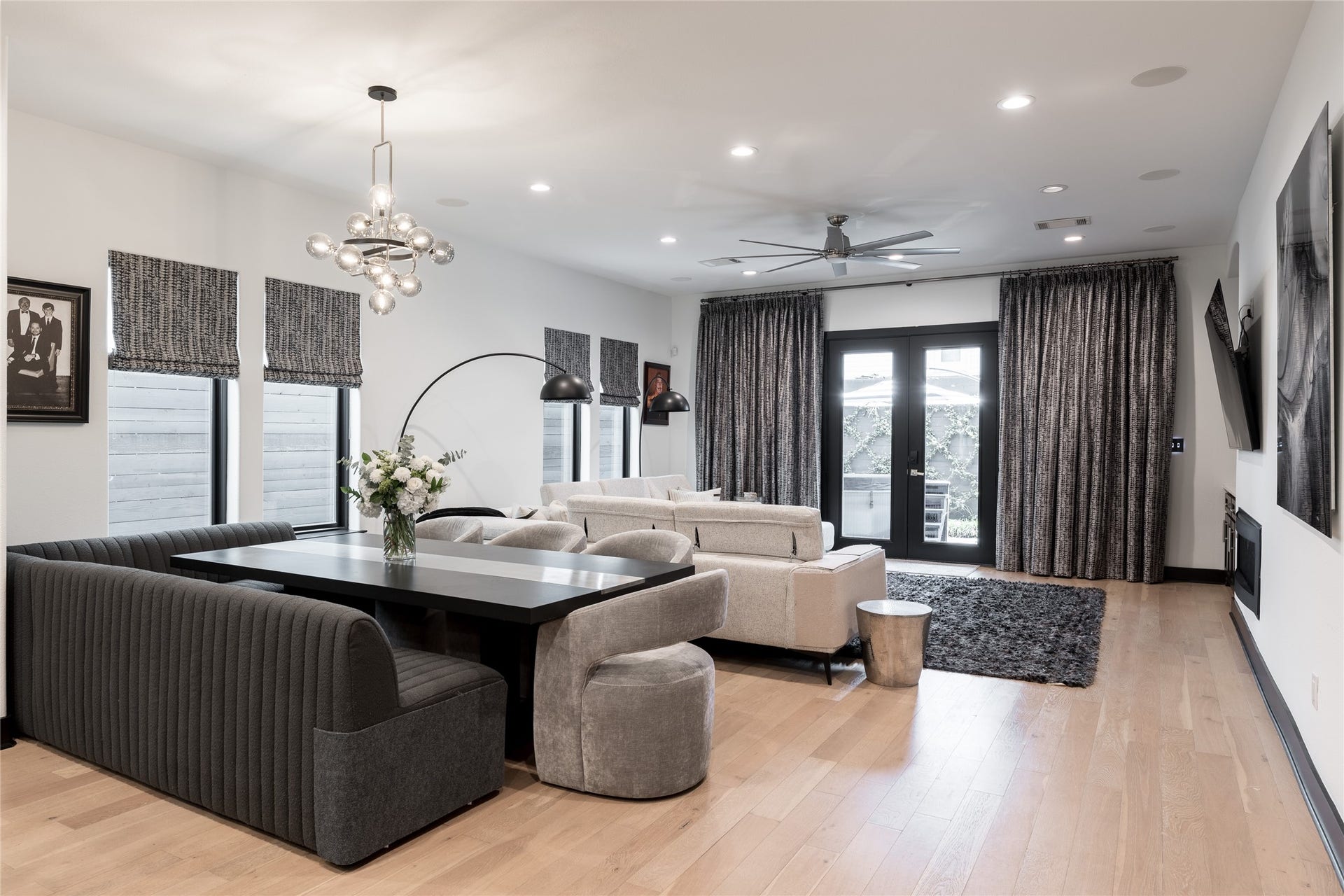 906 Knox Street, Houston, TX 77007 A spacious living room anchors the main level, with abundant natural light, a sleek fireplace and French doors extending the space outdoors.