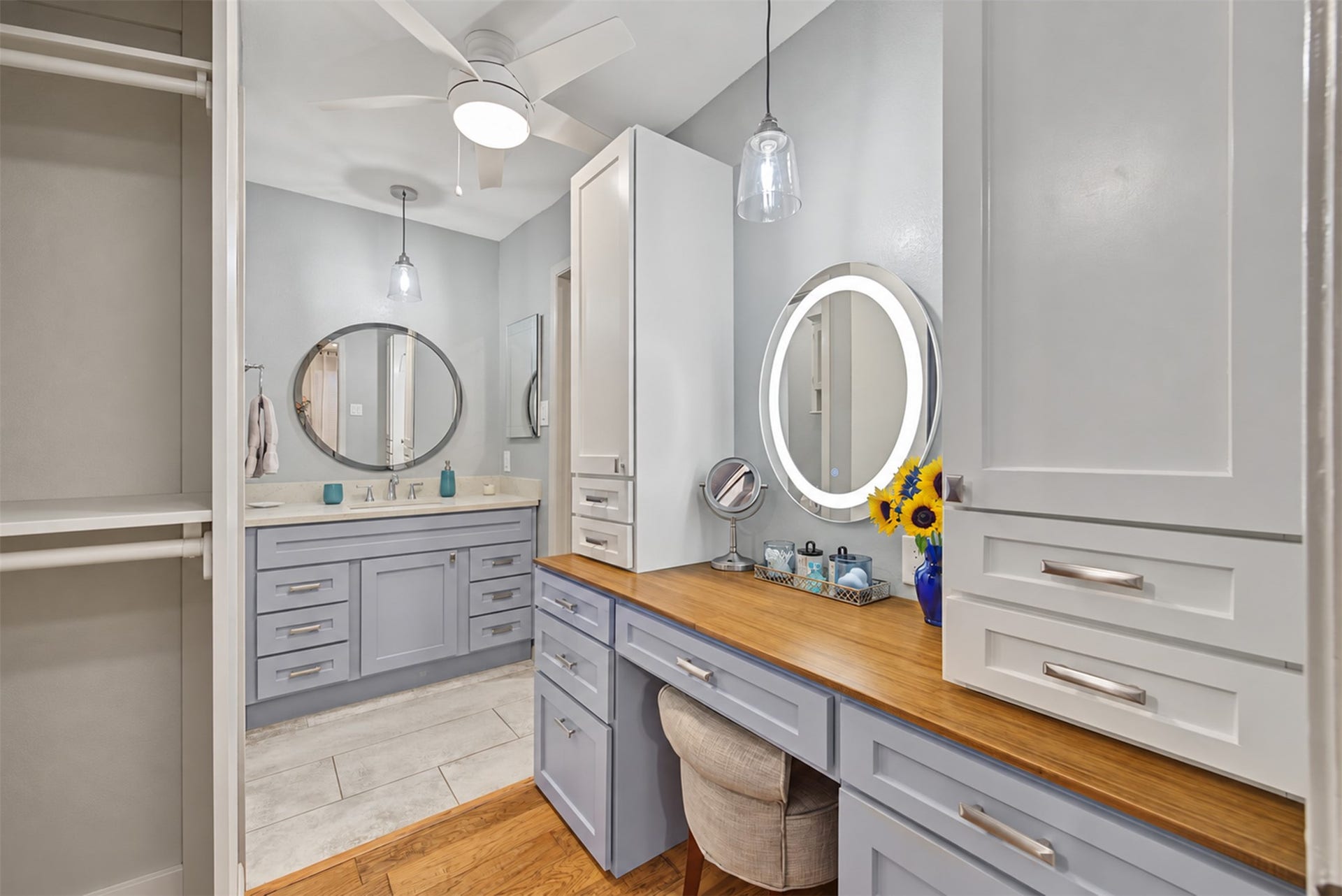 725 Worthshire Street, Houston, TX 77008 Primary dressing area with custom cabinetry and illuminated mirror.