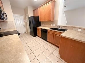 14420 Birch Knoll Lane, Houston, TX 77047 Kitchen with black appliance are included. 2 pantry!