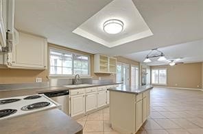 Kitchen opens to breakfast and den