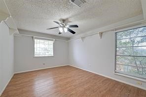 large extra bedroom with accessory shelf around room