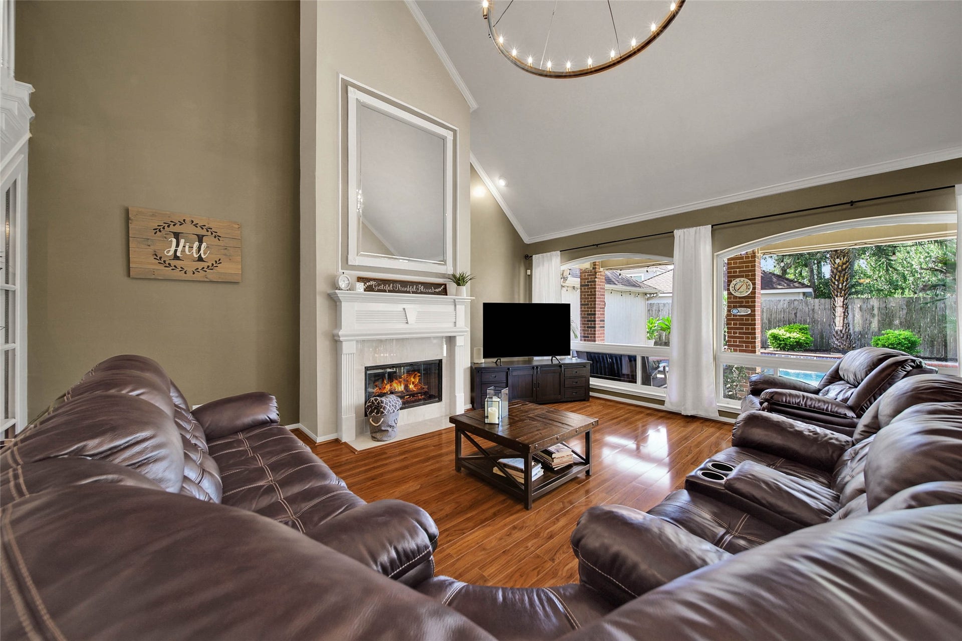 5206 Evergreen Valley Drive, Kingwood, TX 77345 The picture windows and vaulted ceilings allow for the home to stay light and bright with gorgeous views of your backyard paradise.