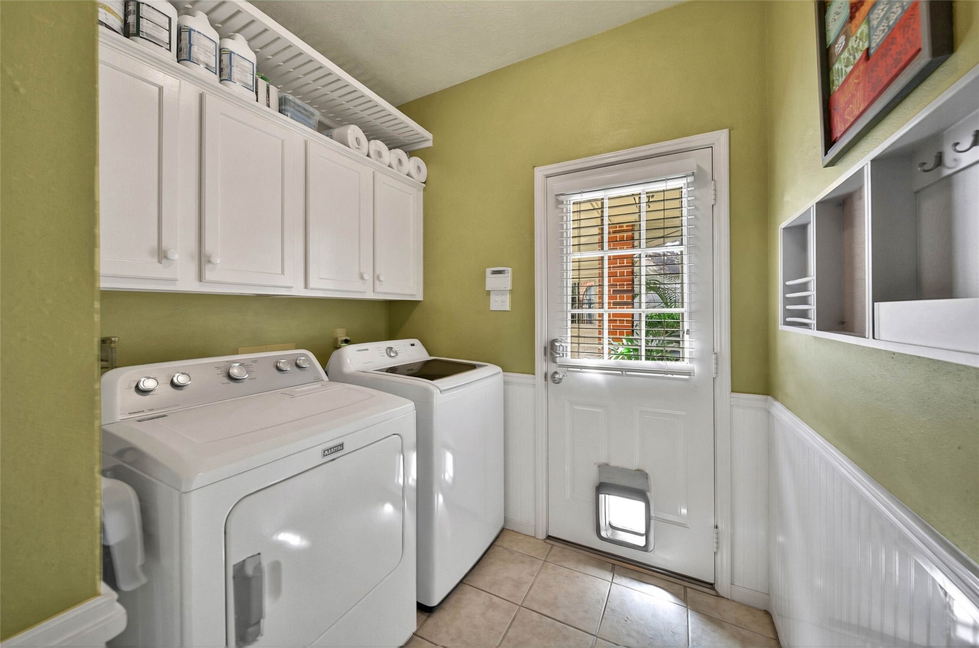 5206 Evergreen Valley Drive, Kingwood, TX 77345 Plenty of storage space in your utility room that conveniently connects to pool access.