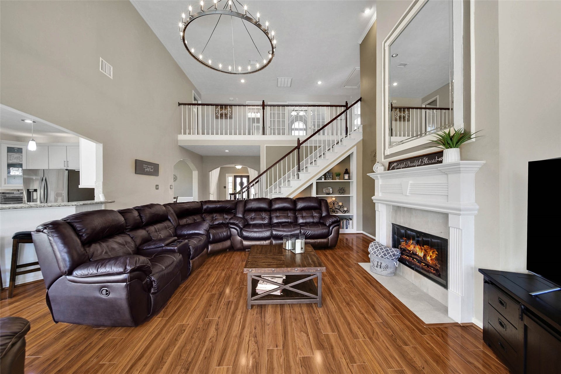 5206 Evergreen Valley Drive, Kingwood, TX 77345 The living room is nice and big and open to the kitchen.