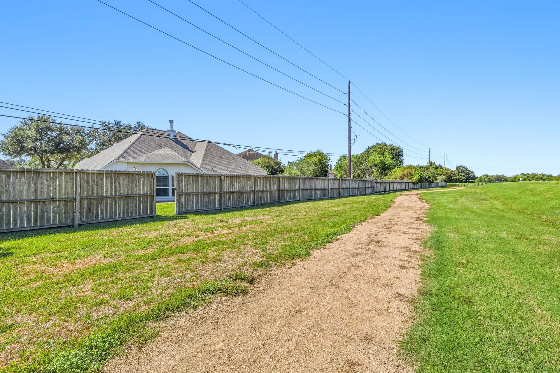 4011 Grayson Court, Missouri City, TX 77459 Enjoy serene outdoor living with this charming home backing onto a walking trail with not back neighbors.