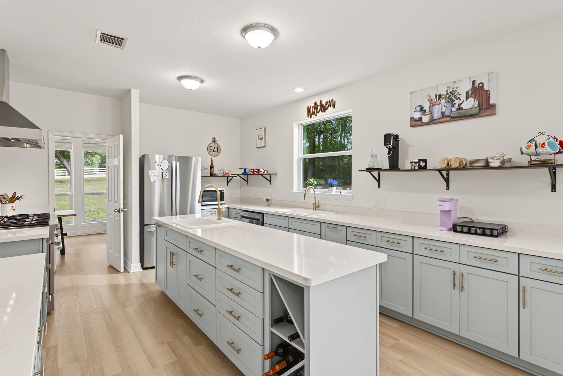 421 Trace Way Drive, Montgomery, TX 77316 Easy access to the dining room, window above the sink and large island.