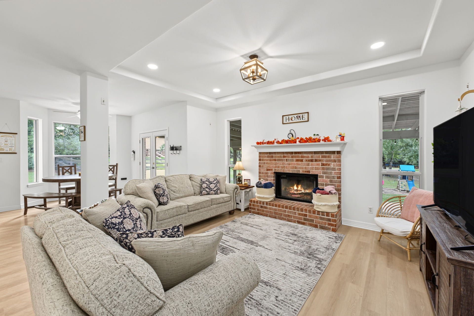 421 Trace Way Drive, Montgomery, TX 77316 Beautiful fire place as your focal point with plenty of windows for natural light.
