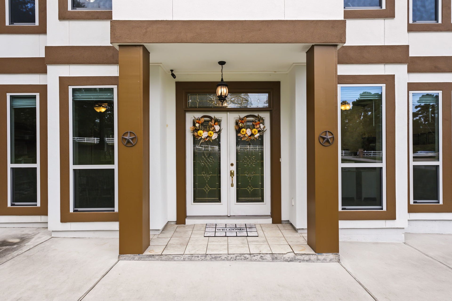 421 Trace Way Drive, Montgomery, TX 77316 Beautiful covered front porch with fresh outside trim paint.
