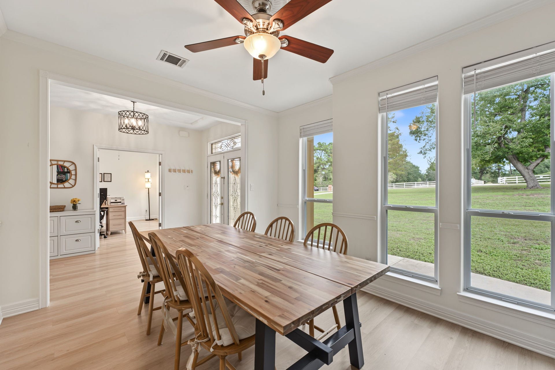 421 Trace Way Drive, Montgomery, TX 77316 View of the dining room overlooking the entrance. Imagine sitting here and watching the baby deer walk through your front yard.