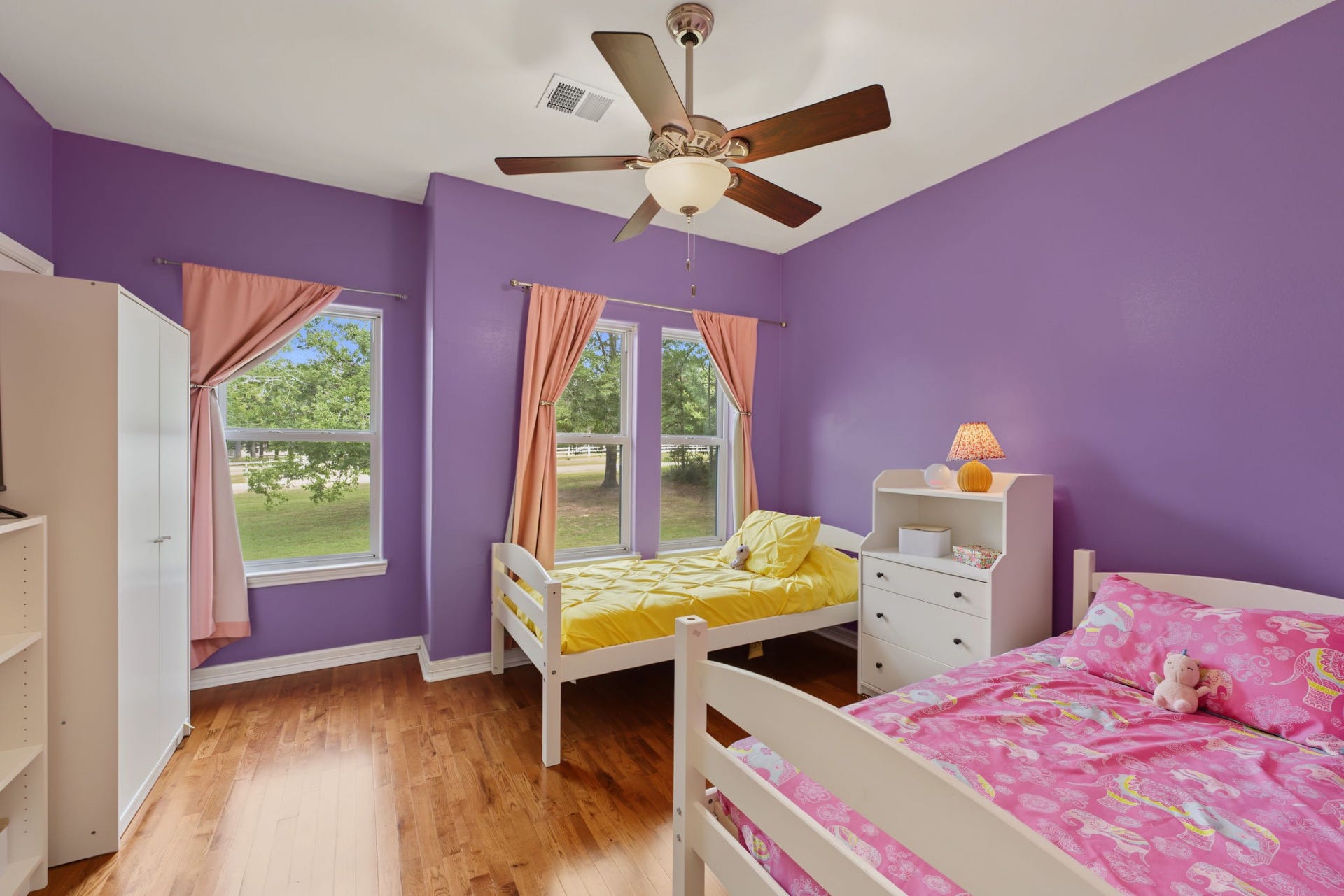 421 Trace Way Drive, Montgomery, TX 77316 Secondary bedroom has a door to the extra room and overlooks the front yard.