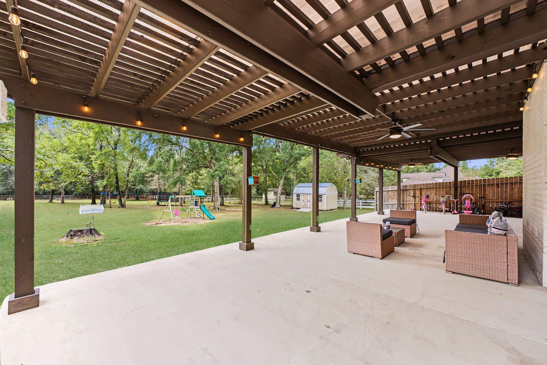 421 Trace Way Drive, Montgomery, TX 77316 Storage shed is on cement. That would be a great area to put a new shop.