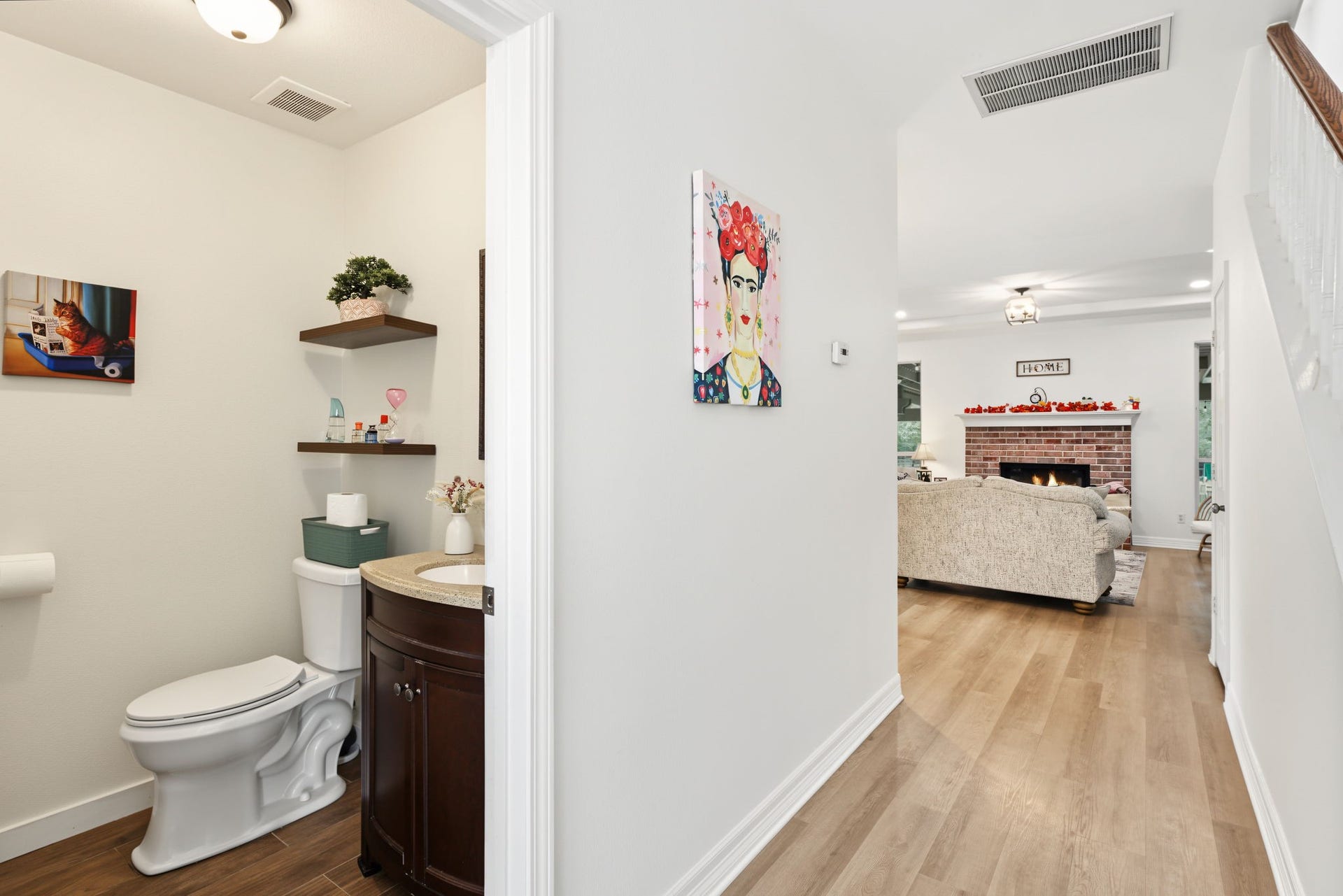 421 Trace Way Drive, Montgomery, TX 77316 Easy access to the living room. Extra storage space under the stairs.