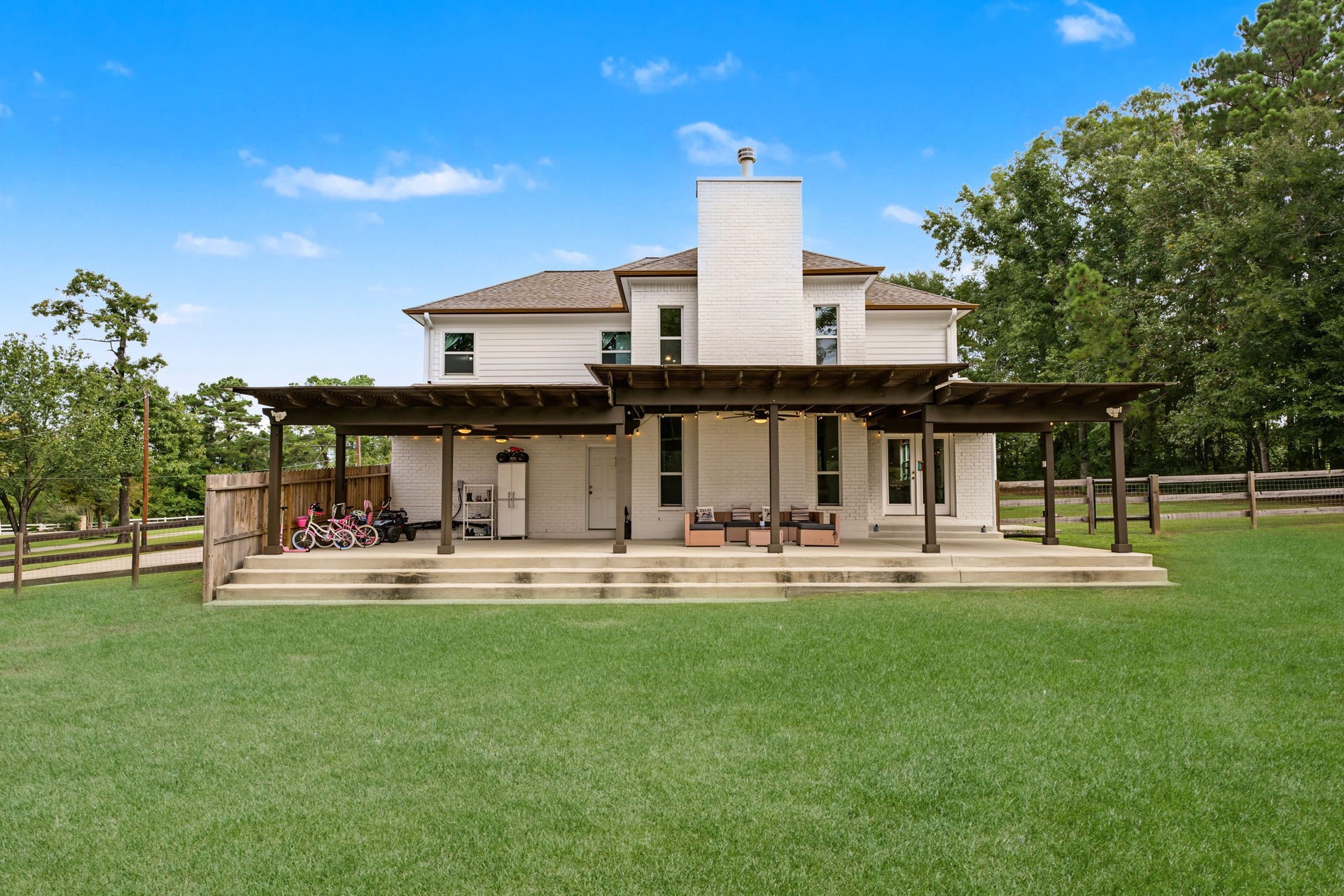 421 Trace Way Drive, Montgomery, TX 77316 View of the back of the home.
