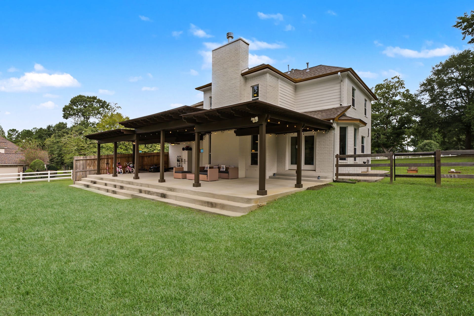 421 Trace Way Drive, Montgomery, TX 77316 View of the covered back patio.