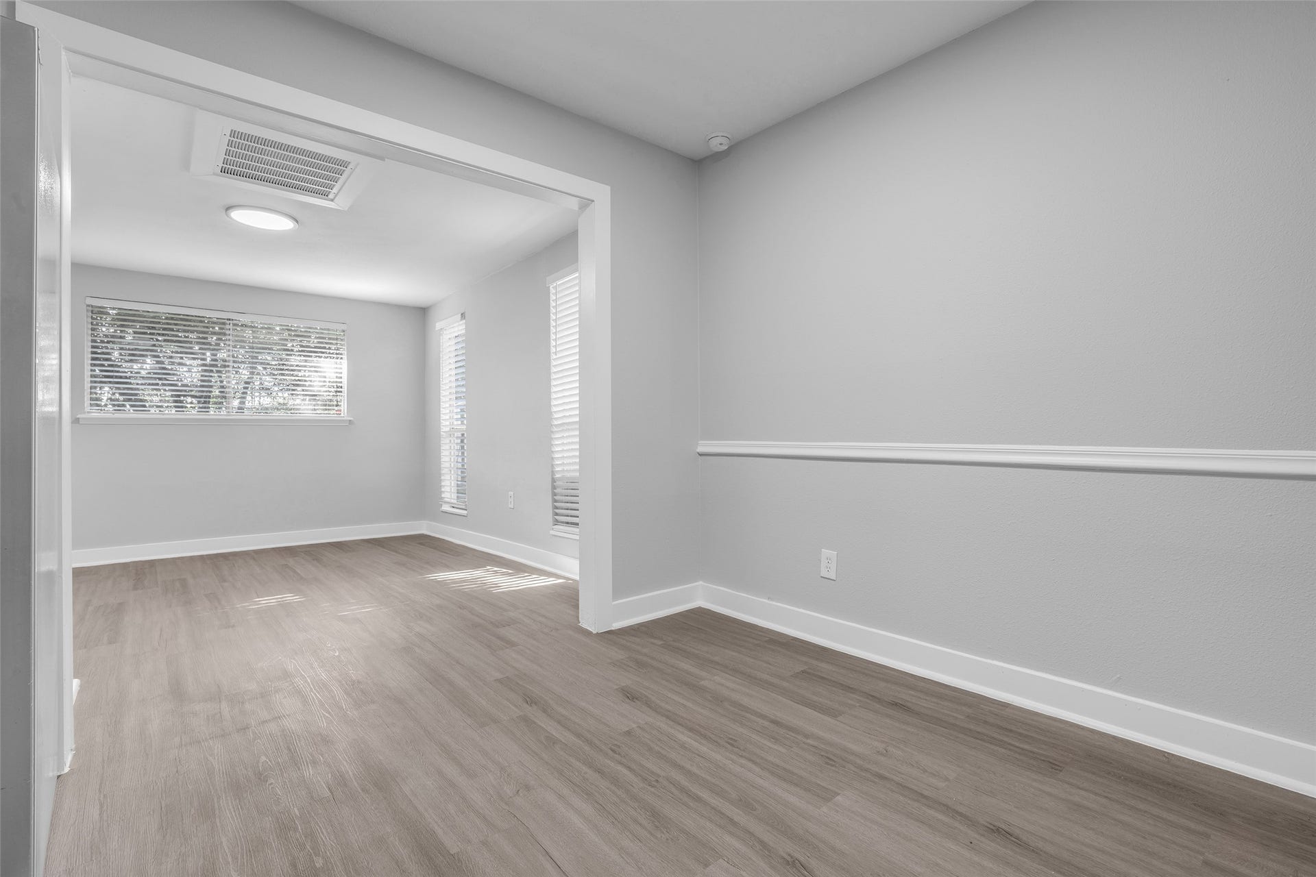 Casual meals and morning coffee flow easily between the breakfast nook and the dining area.