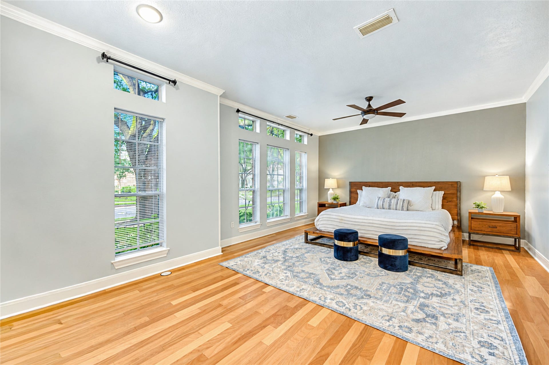 14215 Edinburgh Court, Houston, TX 77077 Retreat to your own private sanctuary in this spacious first-floor primary suite! Beautiful wood flooring, abundant natural light and peaceful views of the lush backyard create a soothing atmosphere. The perfect place to unwind after a busy day, enjoy a slow weekend morning and recharge in comfort and style.