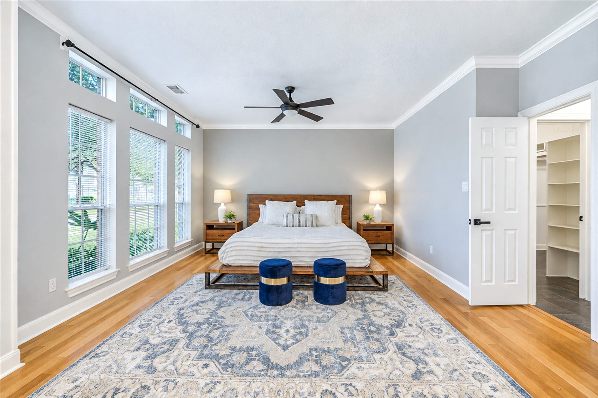 14215 Edinburgh Court, Houston, TX 77077 Wake up refreshed in this spacious first-floor primary retreat, where beautiful natural light, warm wood floors and soothing neutral tones create a peaceful escape. With generous space to relax and unwind, it's the perfect sanctuary to begin and end each day in comfort.