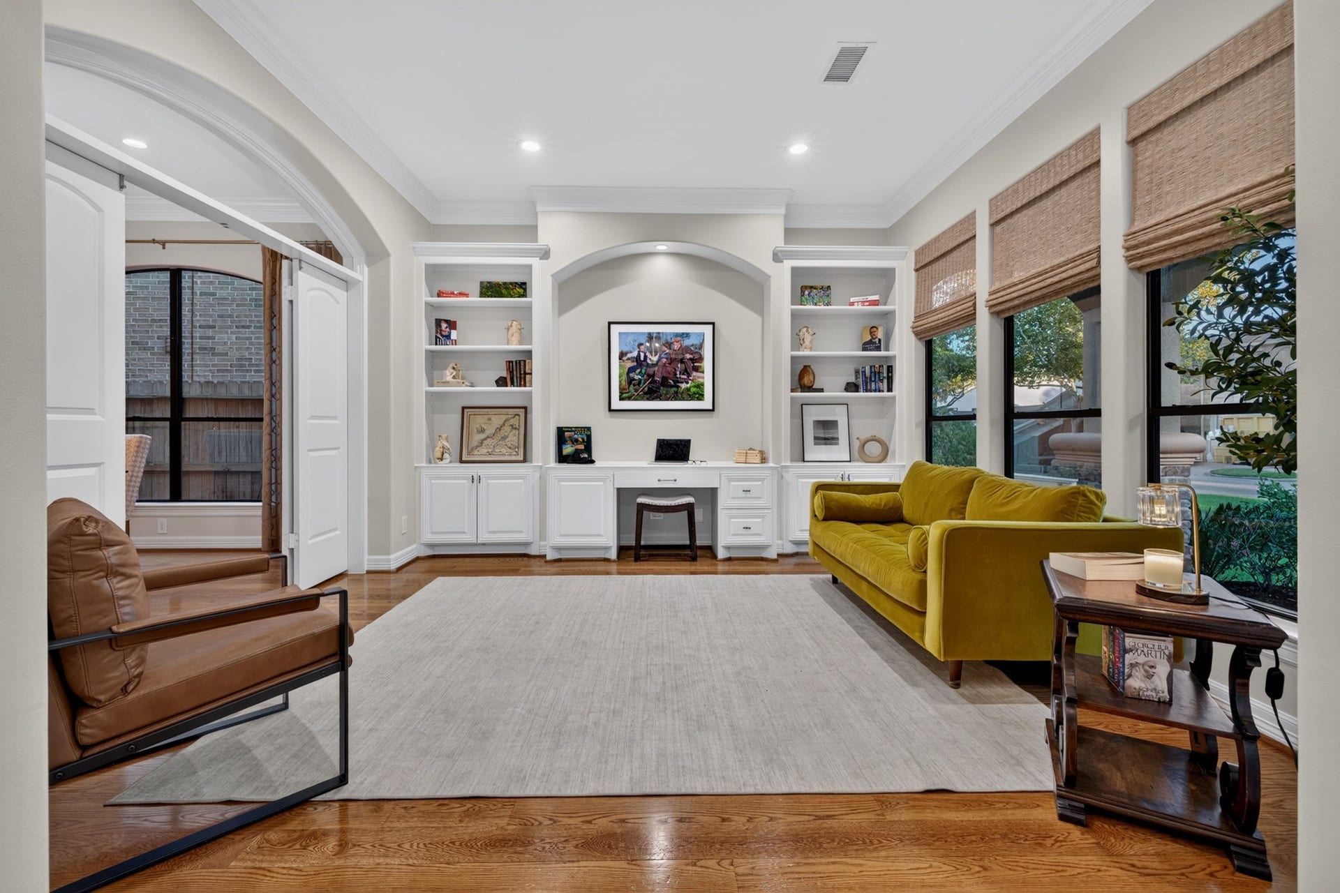 4420 Darsey Street, Bellaire, TX 77401 Just off the entry, the study features built-in shelving and large windows overlooking the front yard.
