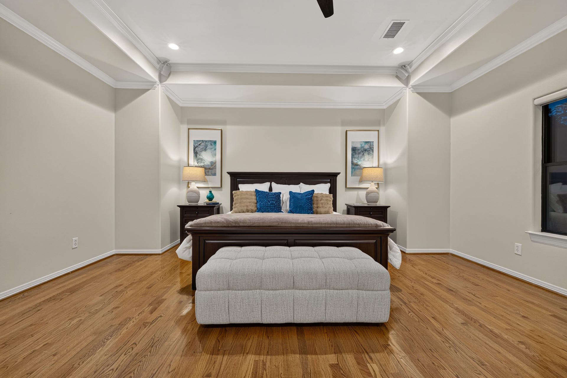 4420 Darsey Street, Bellaire, TX 77401 The primary bedroom features a detailed tray ceiling and generous space for a complete bedroom suite.