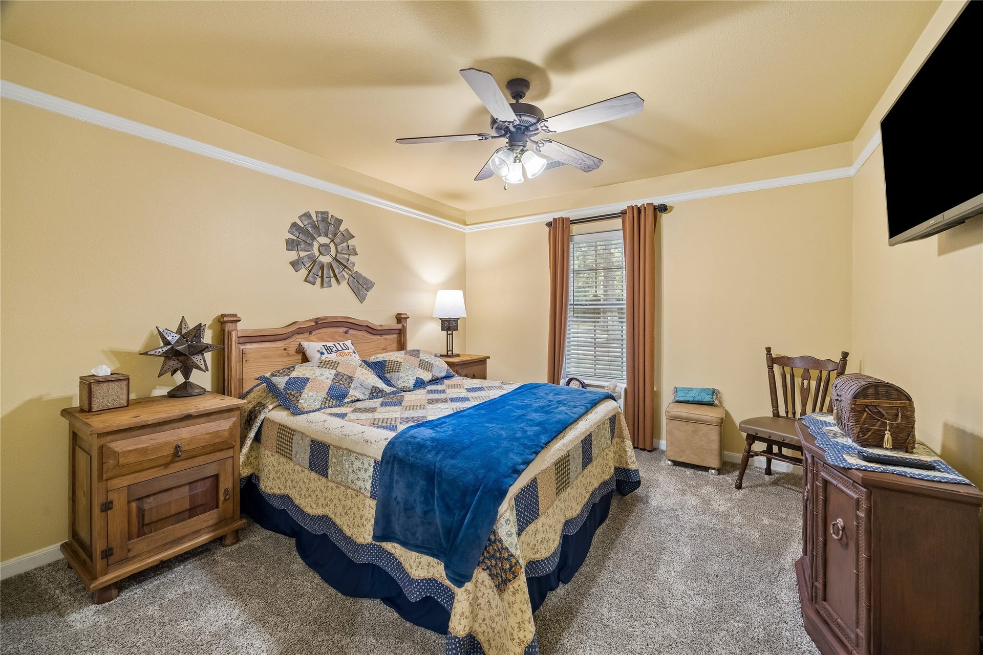 26904 Brentwood Road, Splendora, TX 77372 Bedroom 3 in main home with ceiling fan and crown molding. Main house