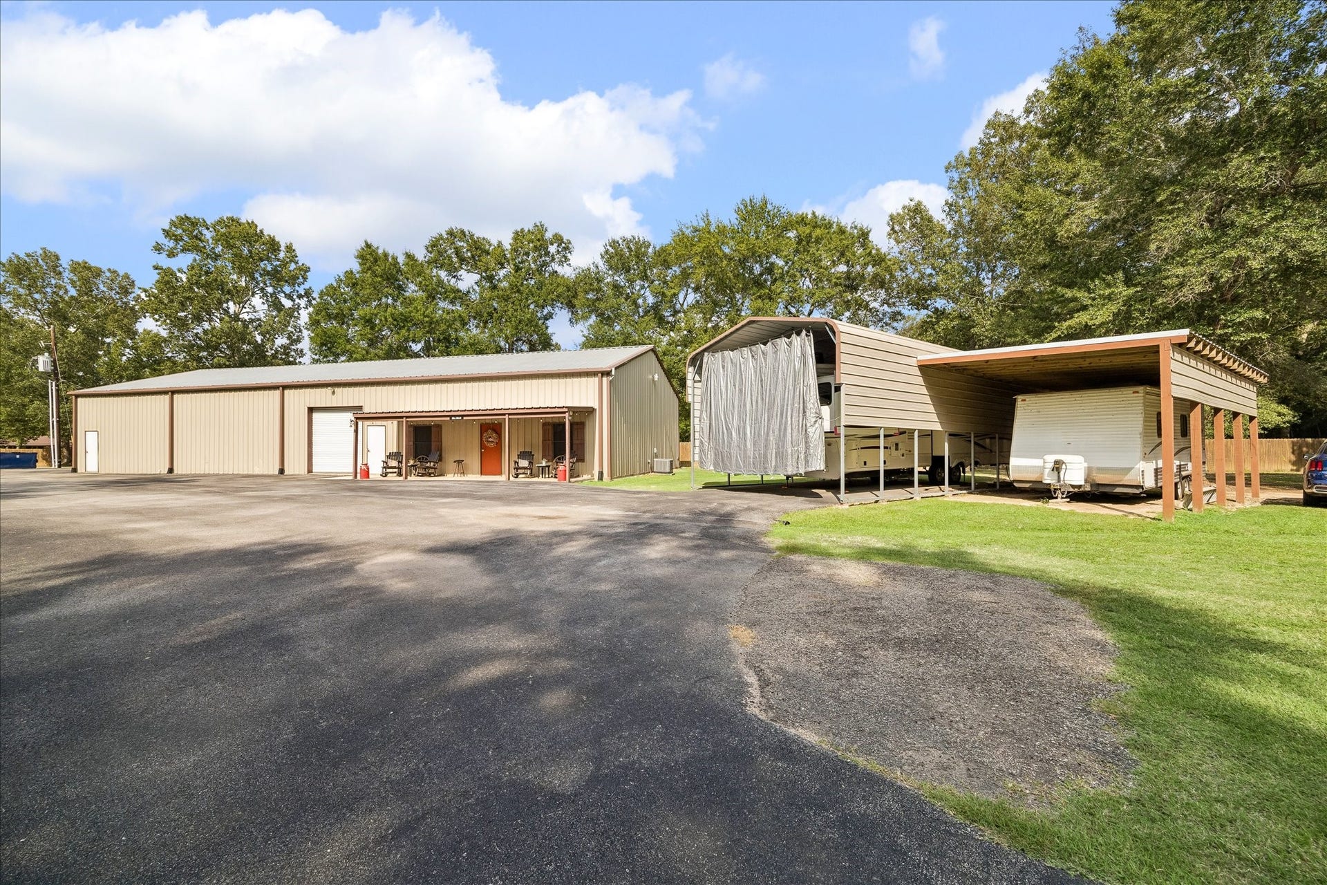 26904 Brentwood Road, Splendora, TX 77372 View of the workshop she shed & 2 covered RV Barns