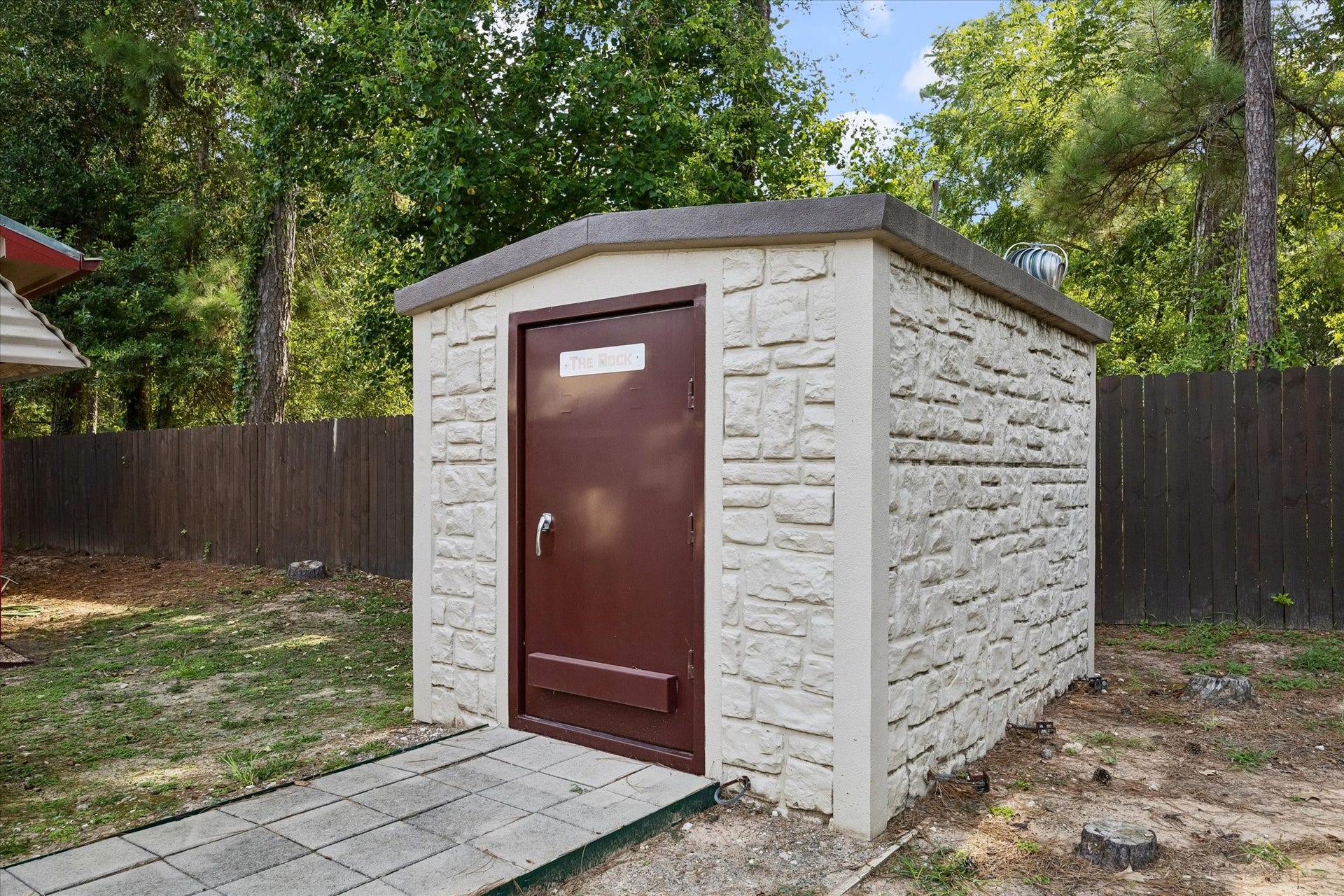 26904 Brentwood Road, Splendora, TX 77372 Peace of mind is built right in with a custom hurricane shelter engineered to comfortably accommodate up to 15 people