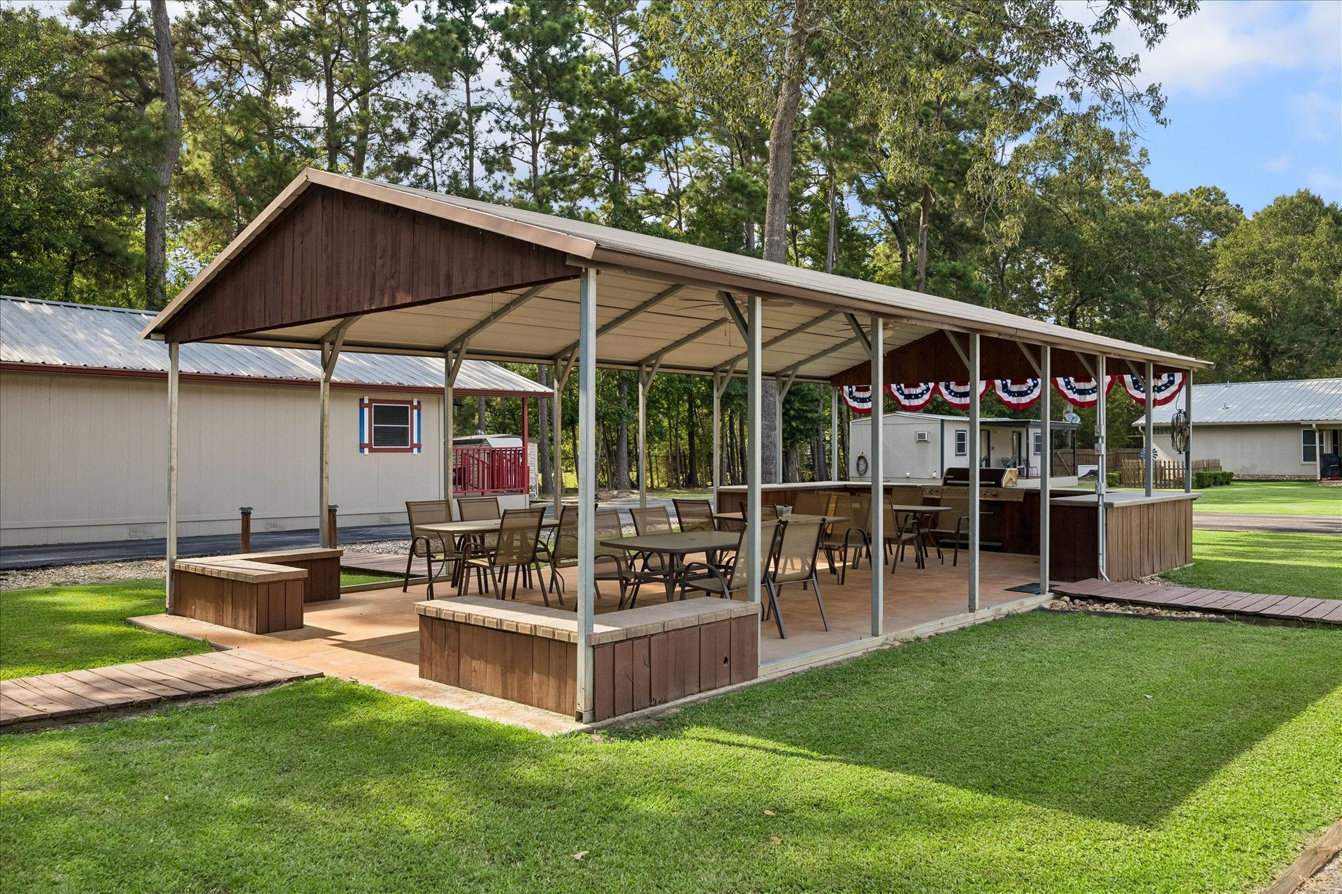 26904 Brentwood Road, Splendora, TX 77372 Outdoor covered pavilion complete with grill table & chairs