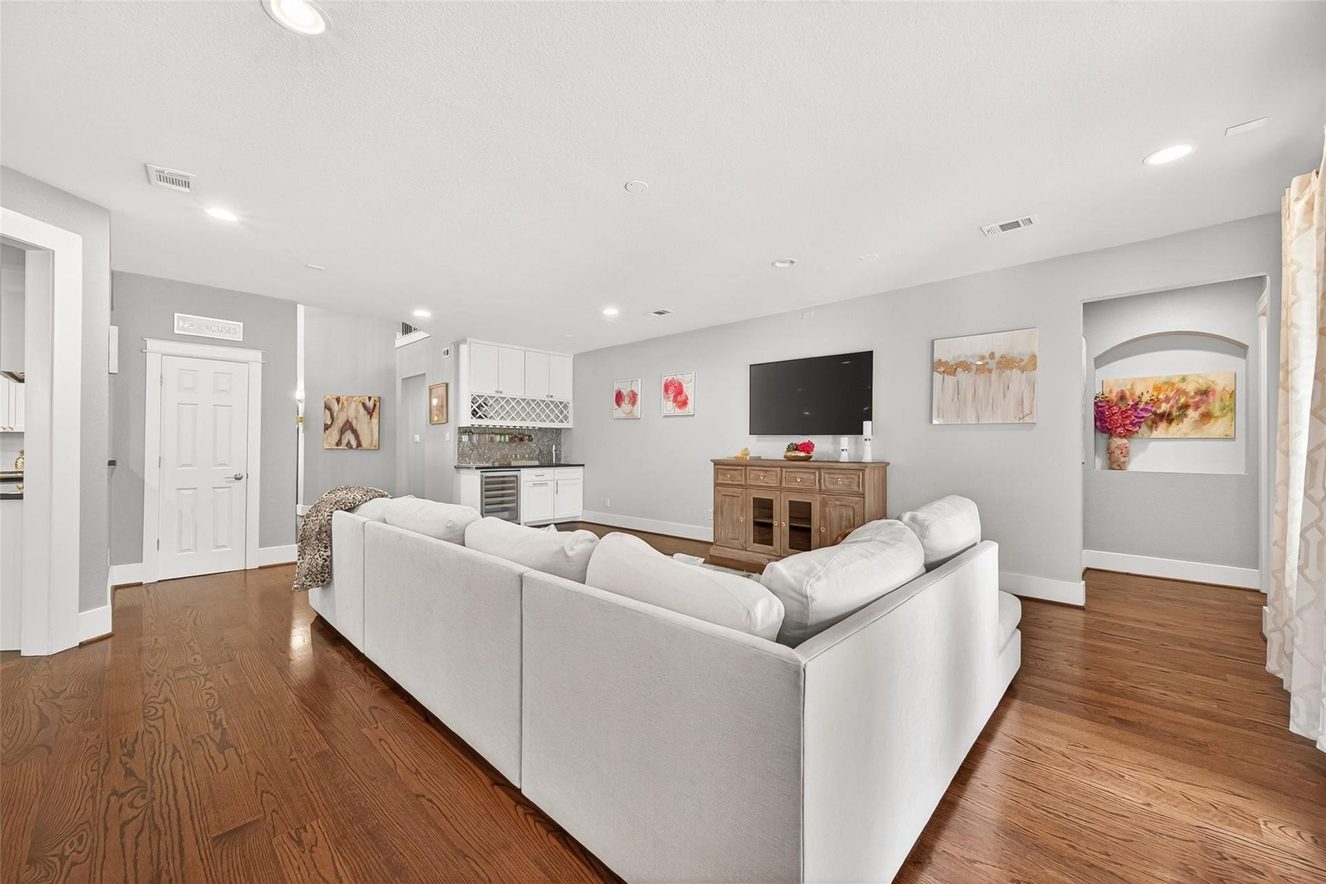 Family room is open to the kitchen and boasts an abundance of natural light with a backyard view.