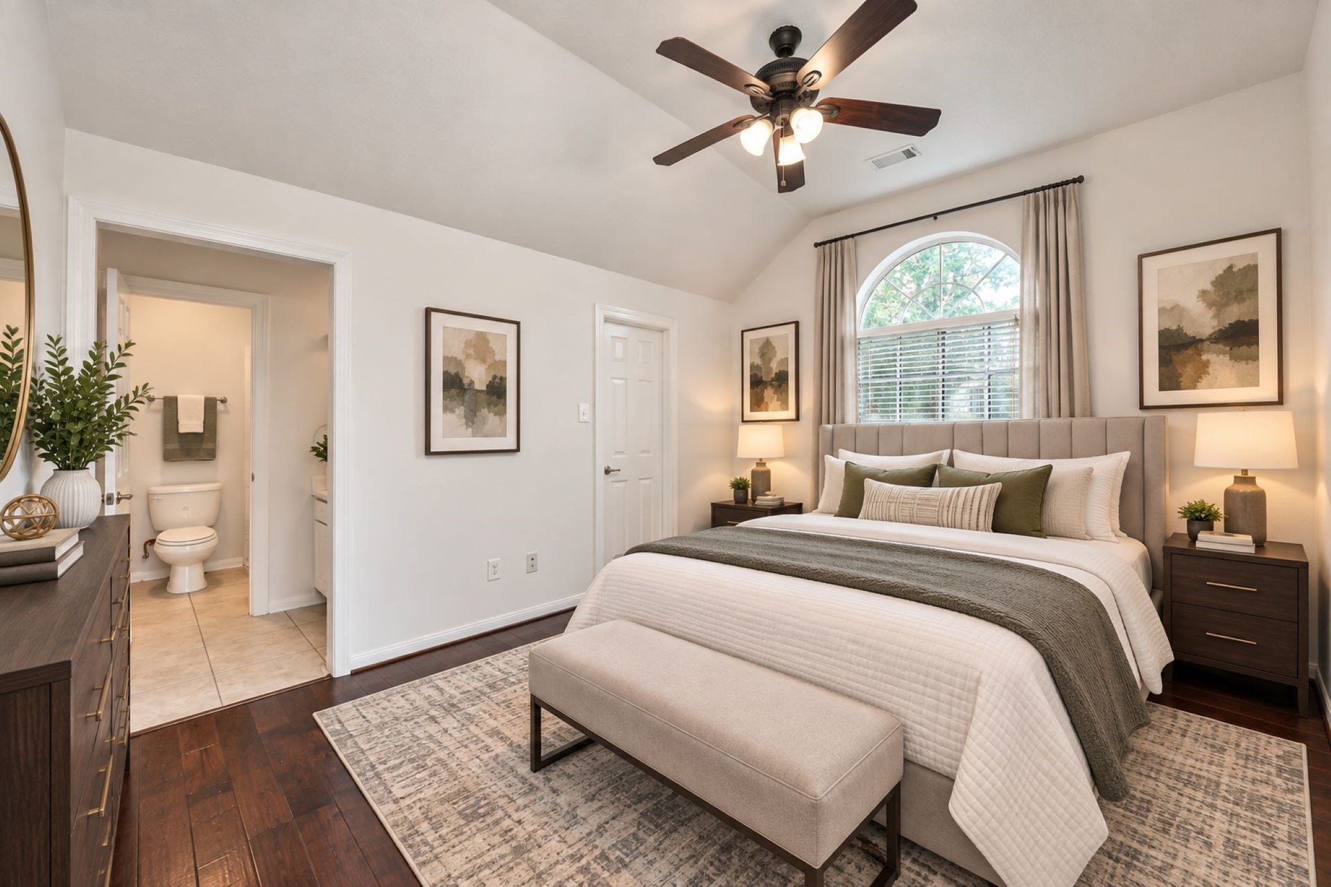 VIRTUAL STAGING
Elegant bedroom with vaulted ceiling, featuring a large window for natural light, cozy seating, and an en-suite bathroom.