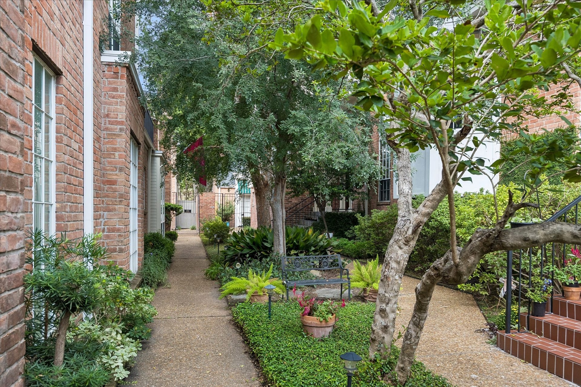 1422 Nantucket Drive, #C, Houston, TX 77057 Landscaped courtyard approach to Unit C, privately positioned at the rear of the three-residence enclave.