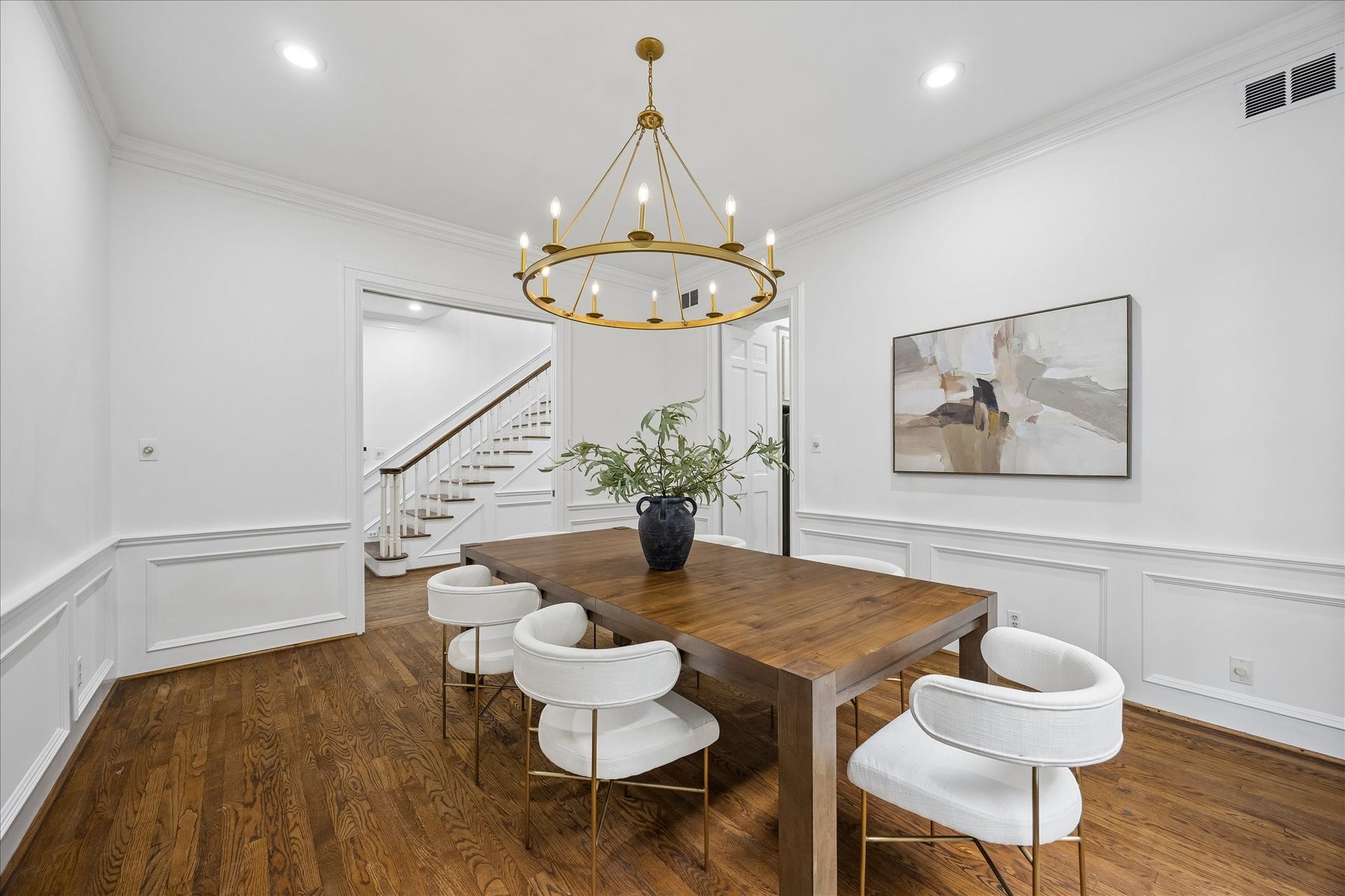 1422 Nantucket Drive, #C, Houston, TX 77057 Formal dining room with hardwood floors, classic millwork and new Perigold chandelier