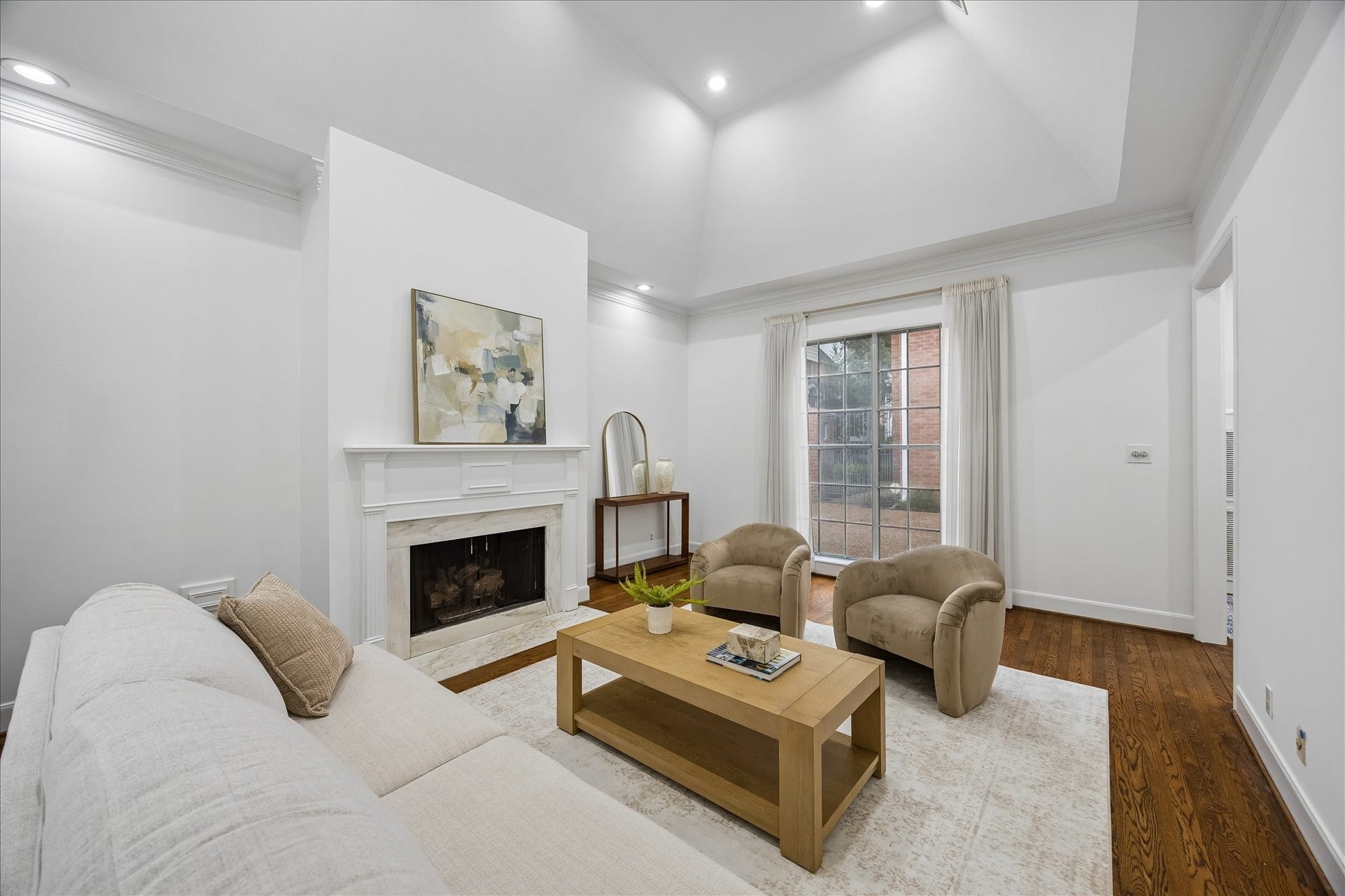 1422 Nantucket Drive, #C, Houston, TX 77057 Large windows fill the formal living room with natural light and overlook the private front patio.