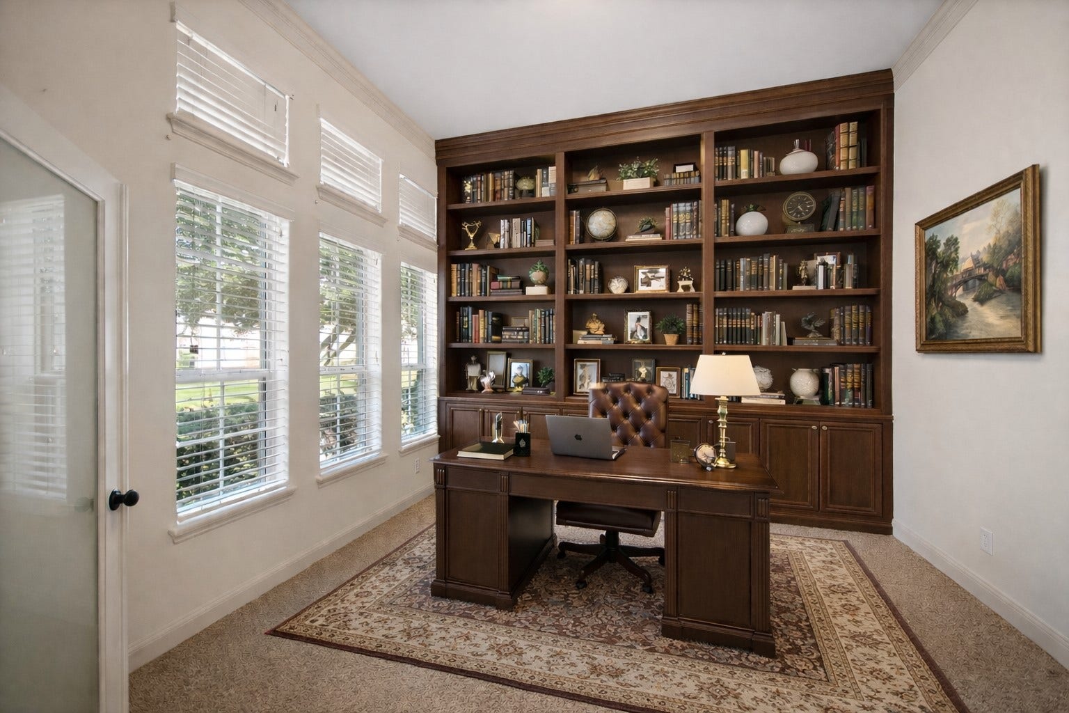 14318 Red Creek Cove Lane, Humble, TX 77396 Home office with a large window wall providing ample natural light. Perfect for a productive work-from-home setup.