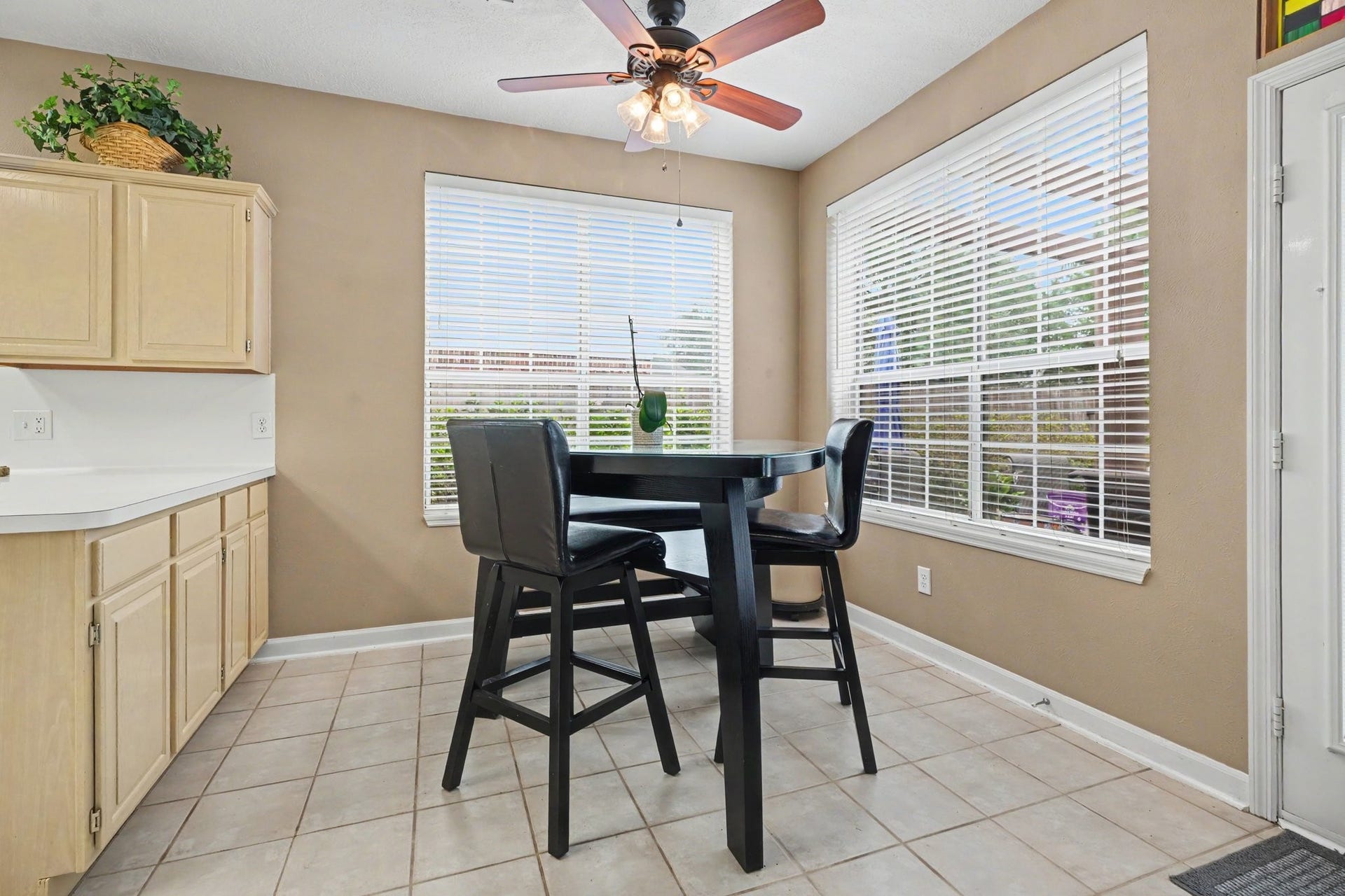 2123 Autumn Cove Drive, League City, TX 77573 Breakfast room with views of the landscaping and pool.